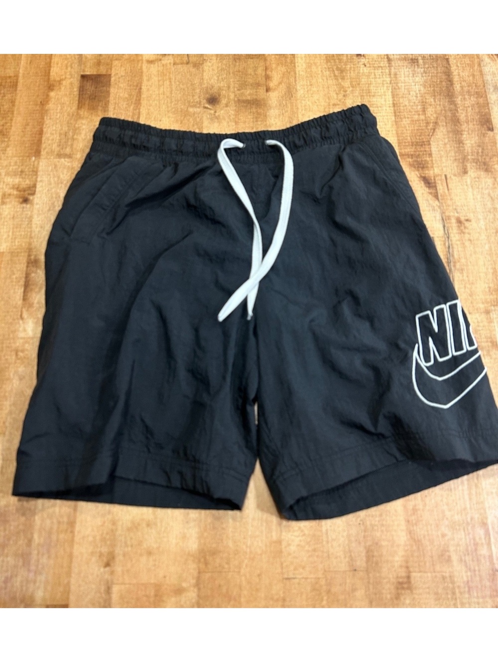 Vintage Nike Men's Black Athletic Shorts with White Drawstring, Size M